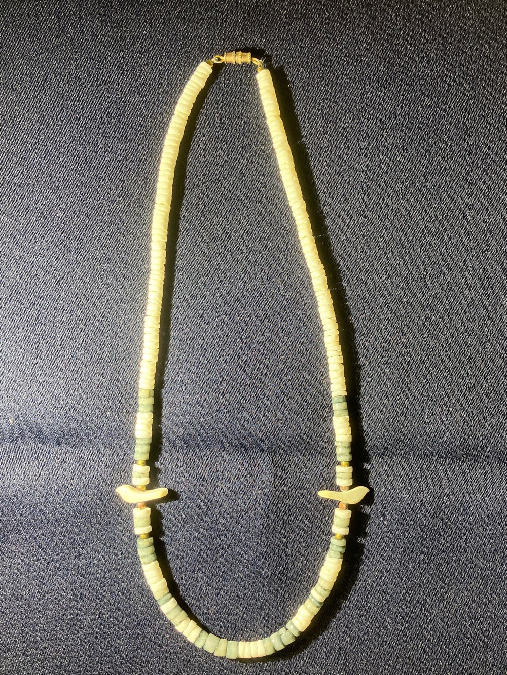 Southwestern vintage Heishi puka shell necklace with carved birds